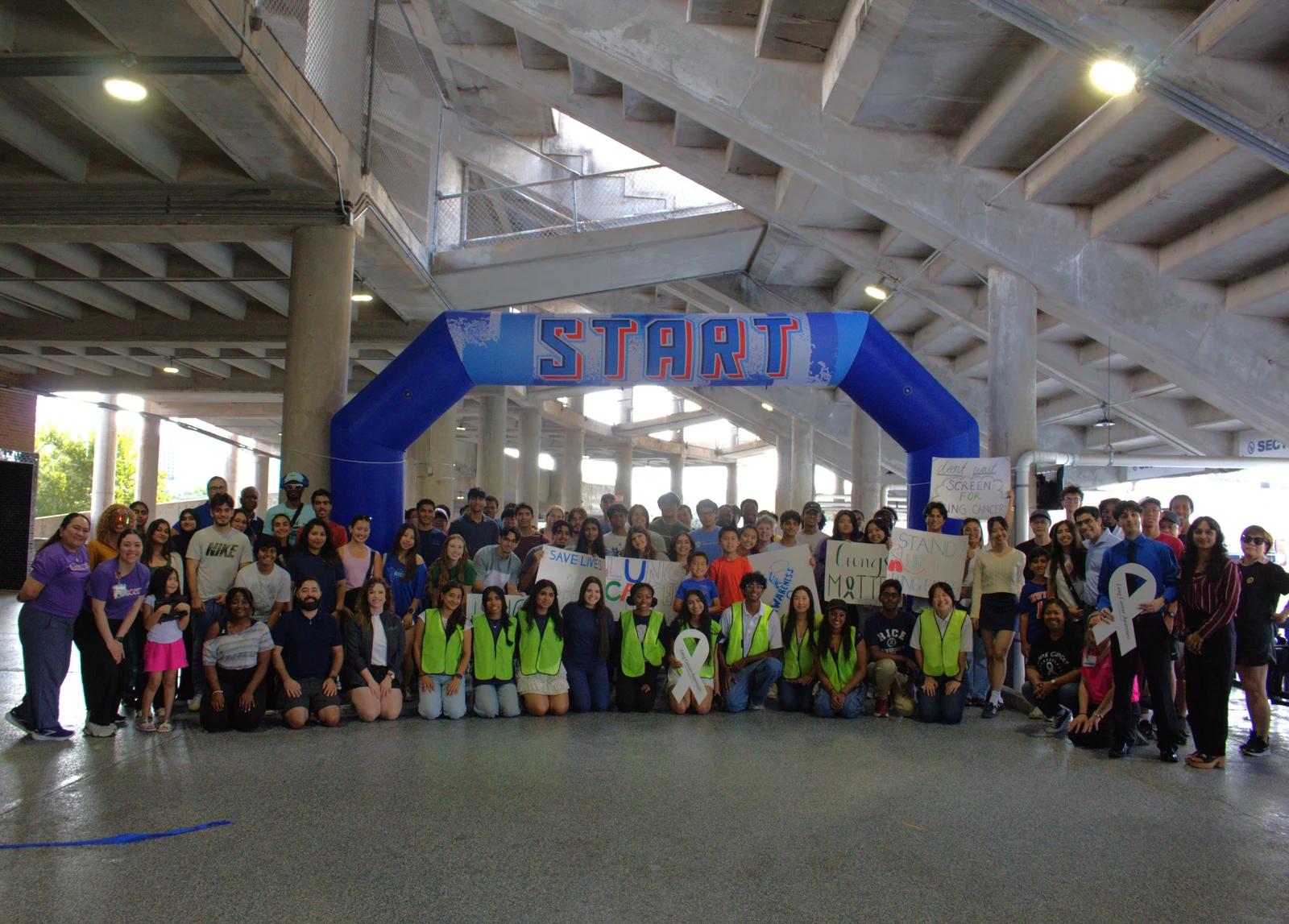 Lung cancer awareness walk participants gathered at the event arch