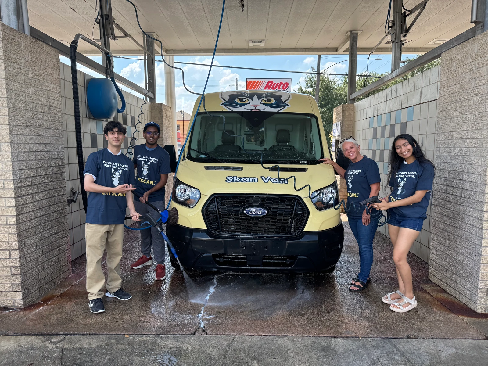 ALCSI volunteers alongside Dusty’s CATskan Van