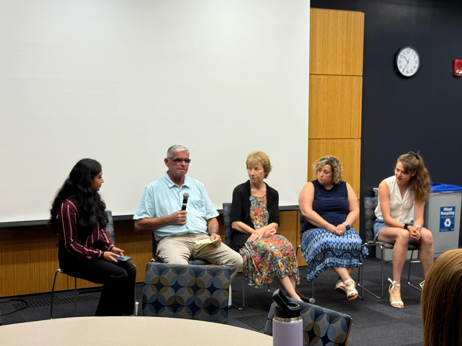 Panelists in conversation at an ALCSI educational event