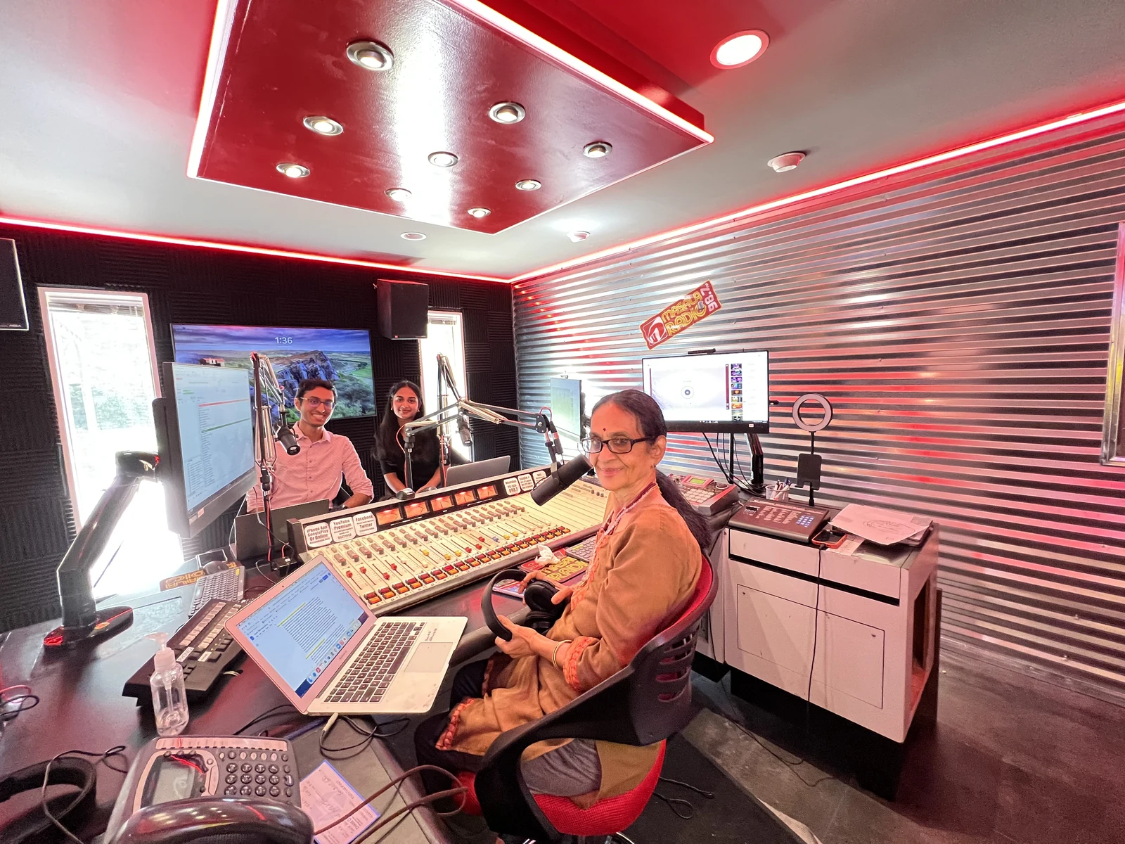A conversation in a recording studio, featured in the ALCSI Podcast