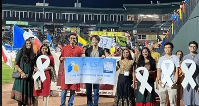 ALCSI members with ribbons at a public awareness event