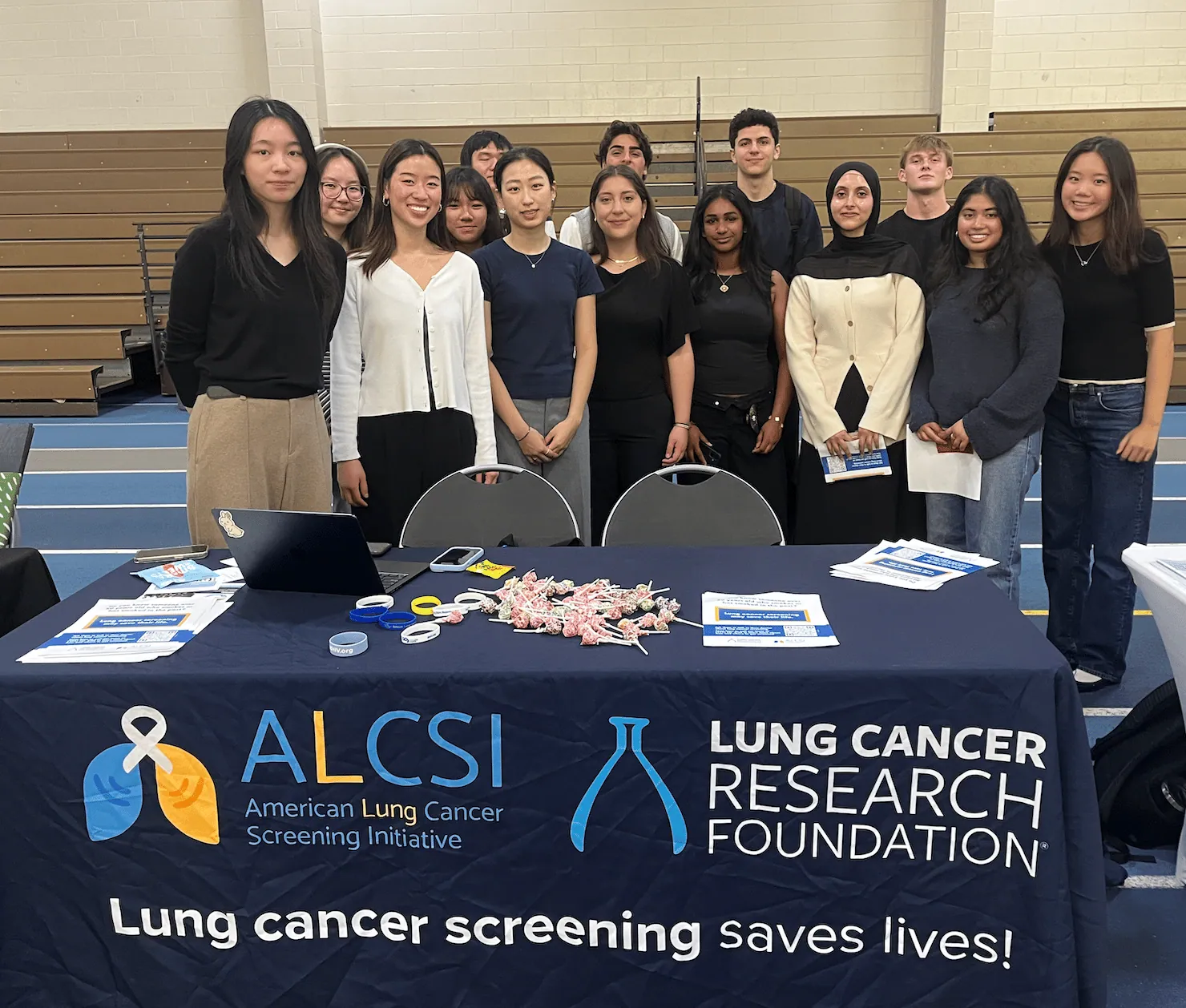 ALCSI members at an indoor screening information table