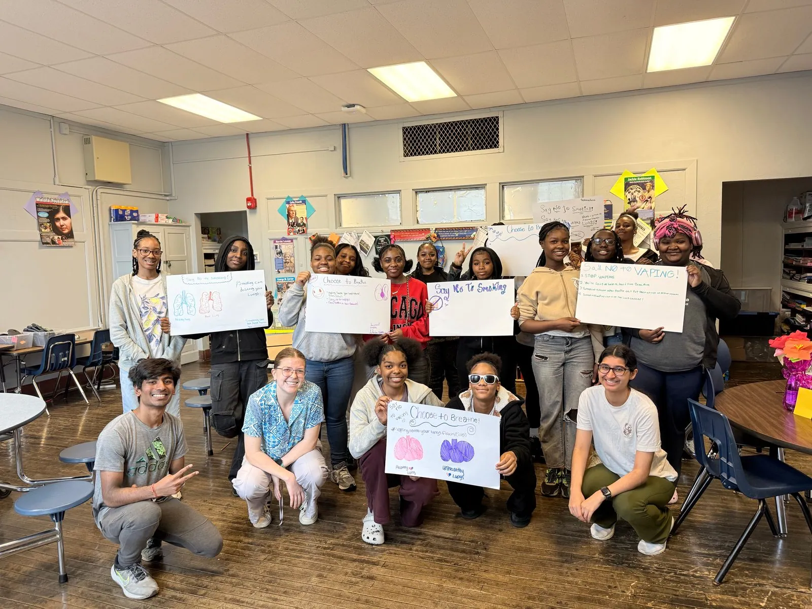 ALCSI group holding lung cancer awareness signs