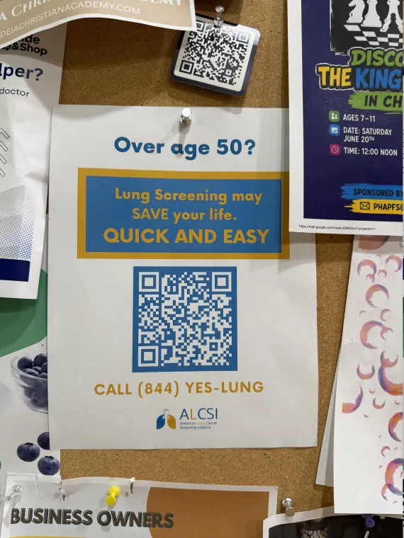 ALCSI lung cancer screening poster with QR code on a bulletin board