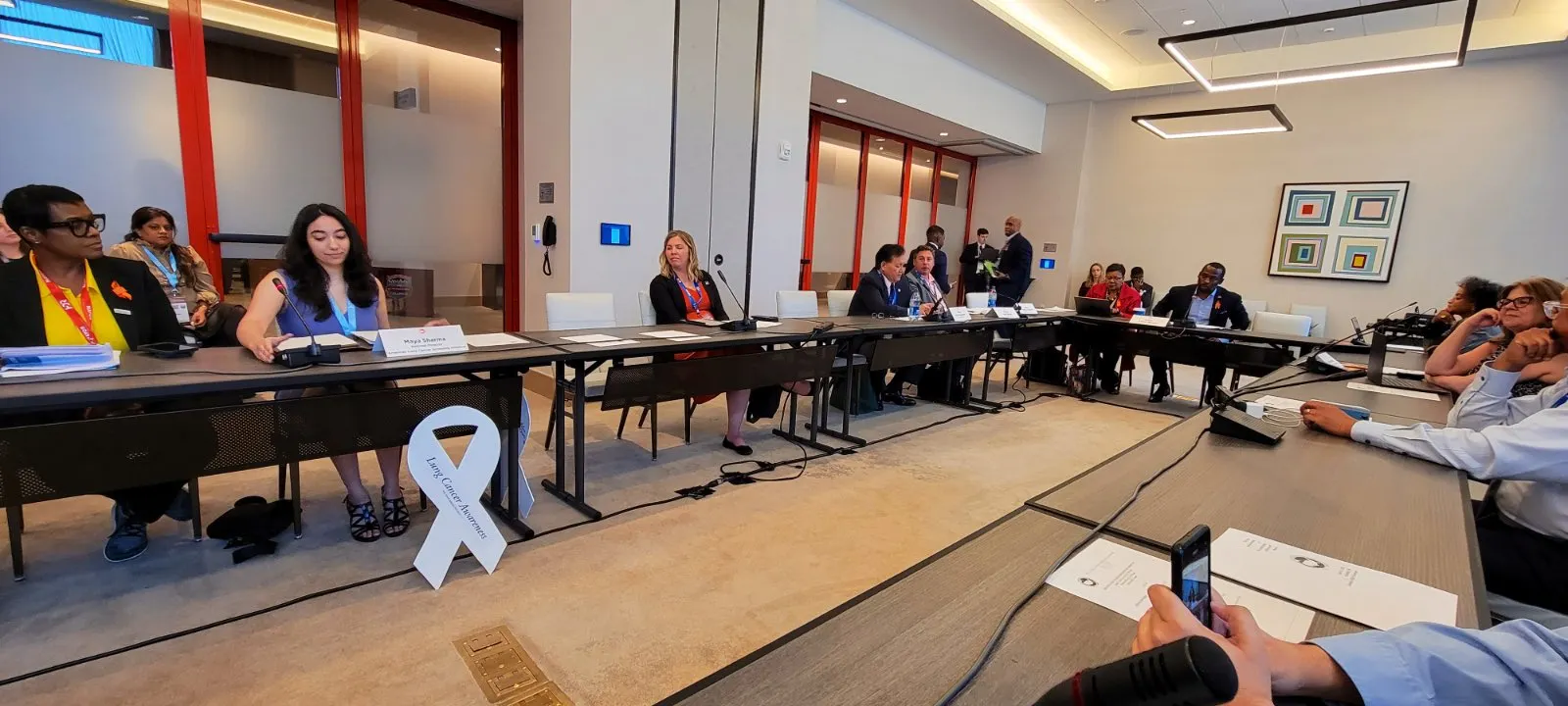 ALCSI members discussing lung cancer screening at a public meeting